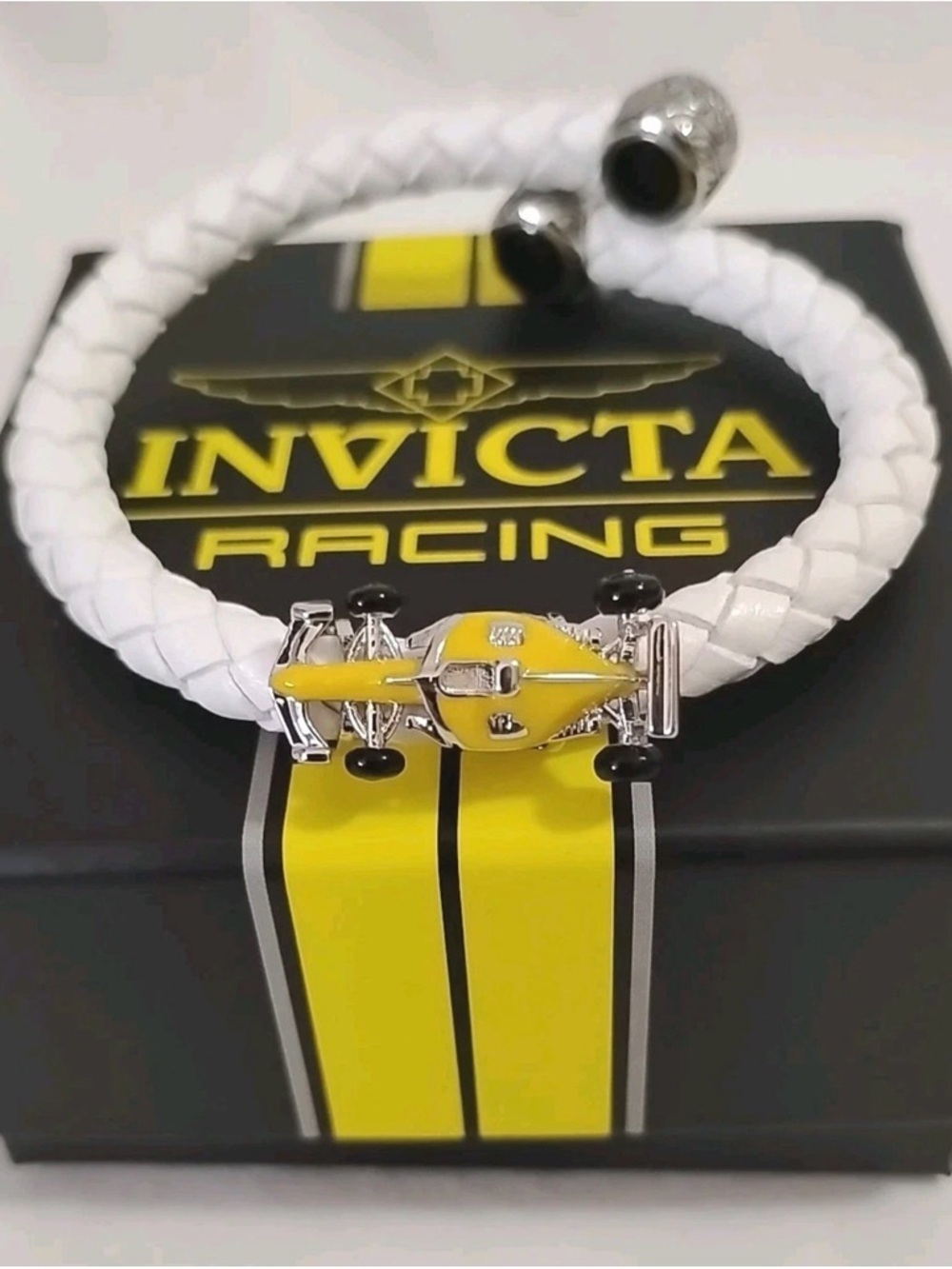 Invicta White Braided Bracelet- Yellow Formula 1 Race Car Charm